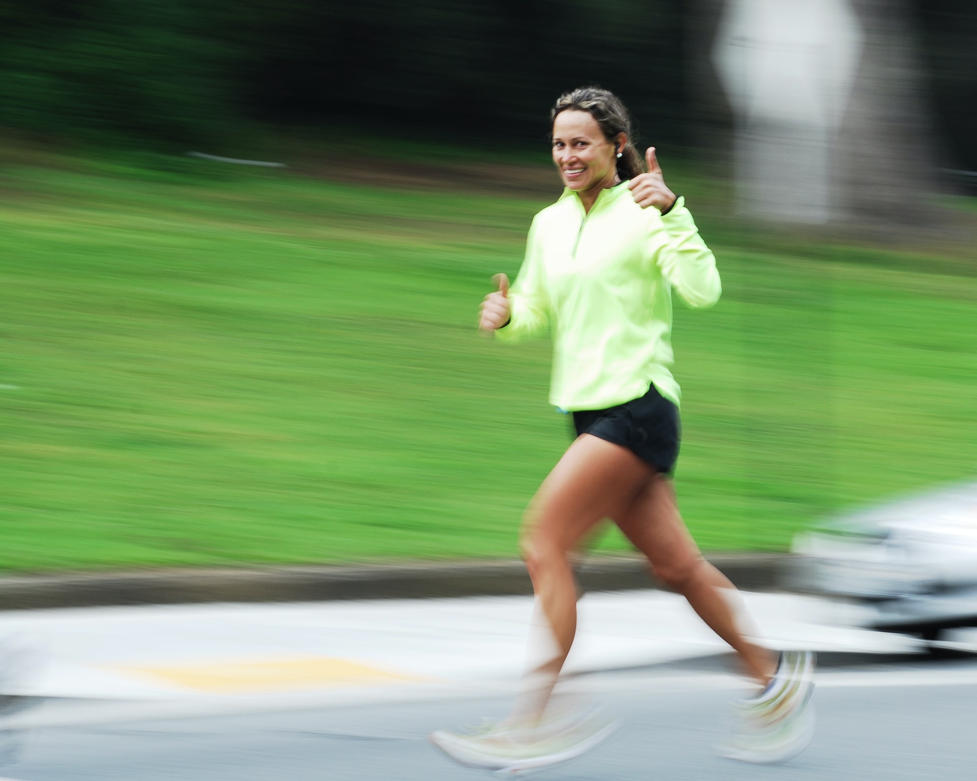 Happy runner in her 40s