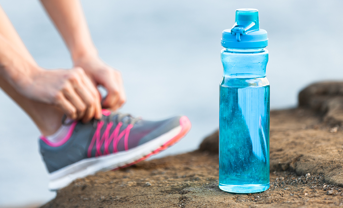 Running with a water bottle